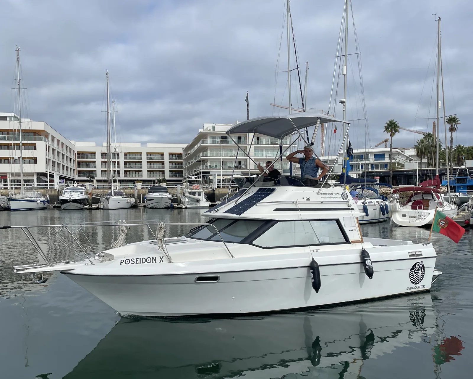 Poseidon X and her skipper at Marina de Lagos